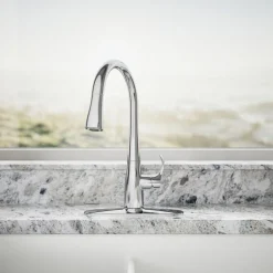 Compact pull-down kitchen sink faucet with three-function sprayhead