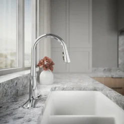 Compact pull-down kitchen sink faucet with three-function sprayhead
