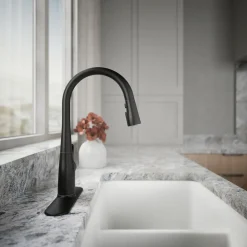 Compact pull-down kitchen sink faucet with three-function sprayhead