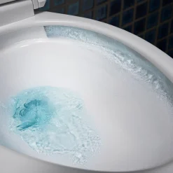ContinuousClean XT two-piece elongated toilet with skirted trapway, 1.28 gpf