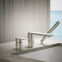 Deck-mount bath faucet with handshower