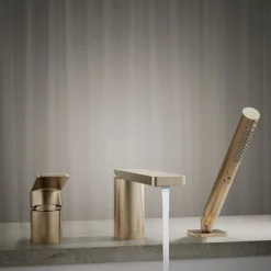 Deck-mount bath faucet with handshower