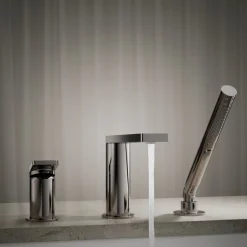 Deck-mount bath faucet with handshower