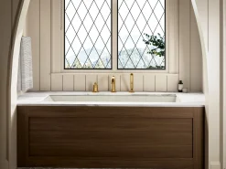Deck-mount bath faucet with handshower