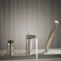 Deck-mount bath faucet with handshower