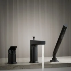 Deck-mount bath faucet with handshower