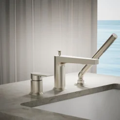Deck-mount bath faucet with handshower