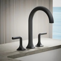 Deck-mount bath spout with Cane design