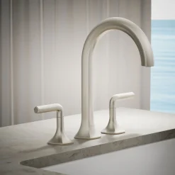 Deck-mount bath spout with Cane design