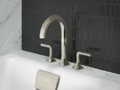 Deck-mount bath spout with Cane design