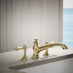 Deck-mount bath spout with flare design