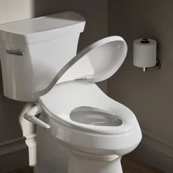 Elongated manual bidet toilet seat