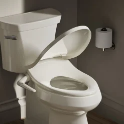 Elongated manual bidet toilet seat