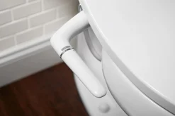 Elongated manual bidet toilet seat