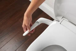 Elongated manual bidet toilet seat