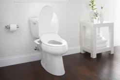 Elongated manual bidet toilet seat