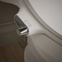 Elongated manual bidet toilet seat