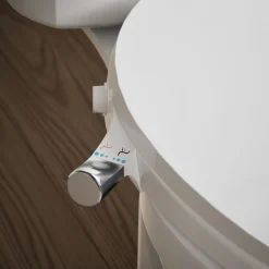 Elongated manual bidet toilet seat