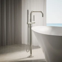 Floor-mount bath filler trim with handshower