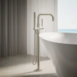Floor-mount bath filler trim with handshower