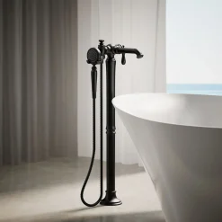 Floor-mount bath filler trim with handshower