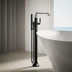 Floor-mount bath filler trim with handshower