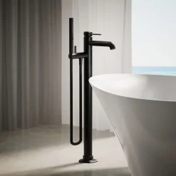 Floor-mount bath filler trim with handshower