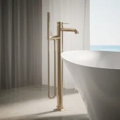 Floor-mount bath filler trim with handshower