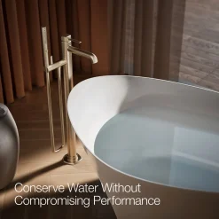 Floor-mount bath filler trim with handshower