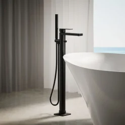 Floor-mount bath filler trim with handshower