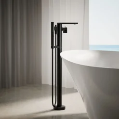 Floor-mount bath filler trim with handshower