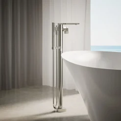 Floor-mount bath filler trim with handshower