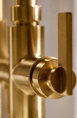 Floor-mount bath filler trim with handshower