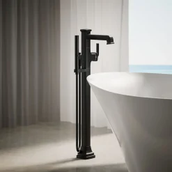 Floor-mount bath filler trim with handshower