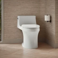 Hidden cord one-piece compact elongated toilet with concealed trapway, 1.28 gpf toilet