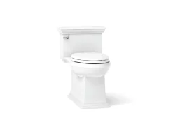 One-piece compact elongated toilet with skirted trapway, 1.28 gpf