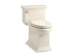 One-piece compact elongated toilet with skirted trapway, 1.28 gpf