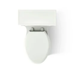 One-piece compact elongated toilet with skirted trapway, 1.28 gpf