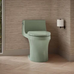 One-piece compact elongated toilet with concealed trapway, 1.28 gpf