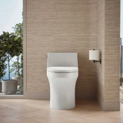 One-piece compact elongated toilet with concealed trapway, 1.28 gpf