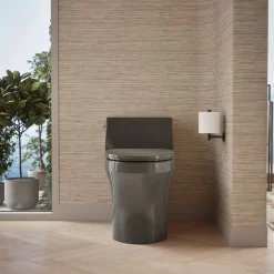 One-piece compact elongated toilet with concealed trapway, 1.28 gpf