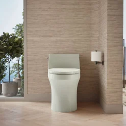 One-piece compact elongated toilet with concealed trapway, 1.28 gpf