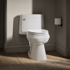 One-piece elongated toilet with concealed trapway, 1.28 gpf