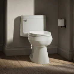One-piece elongated toilet with concealed trapway, 1.28 gpf