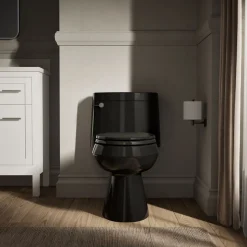 One-piece elongated toilet with concealed trapway, 1.28 gpf