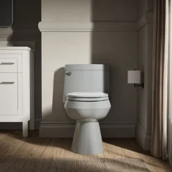 One-piece elongated toilet with concealed trapway, 1.28 gpf