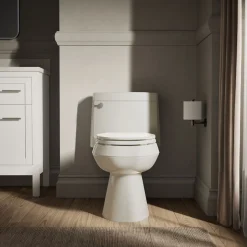 One-piece elongated toilet with concealed trapway, 1.28 gpf