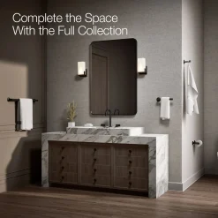 Pivoting toilet paper holder