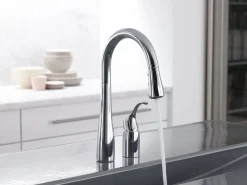 Pull-down bar sink faucet with three-function sprayhead