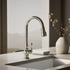 Pull-down kitchen sink faucet with three-function sprayhead
